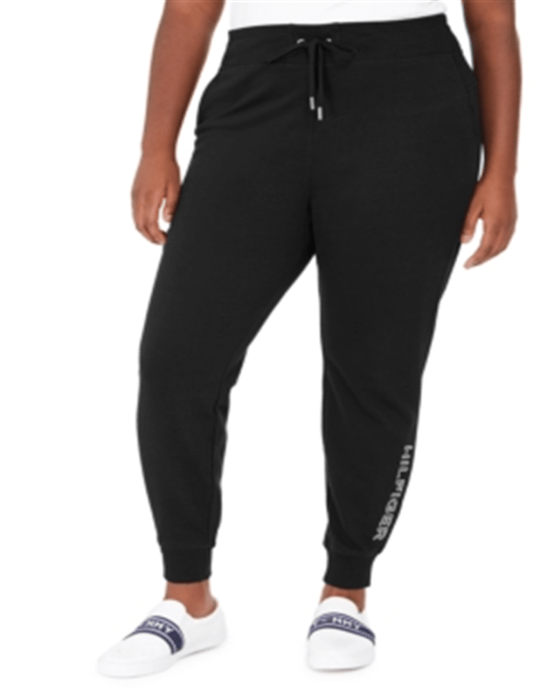 Front of a model wearing a size 0X Tommy Hilfiger Women's Sport Logo Joggers Black 0X in Black by Tommy Hilfiger. | dia_product_style_image_id:308633